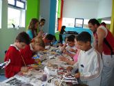 Ms de medio centenar de niños y jvenes participan diariamente en las actividades organizadas en la “Eduteca puzzle”