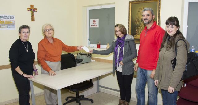 Tres grupos festeros hacen un donativo a Cáritas - 1, Foto 1