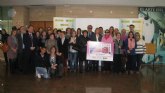 Familia presenta el cupn de la ONCE dedicado a conmemorar el Da Internacional de la Mujer