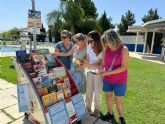 El servicio de 'Bibliopiscina' seguir en marcha durante el mes de agosto para fomentar la lectura en las piscinas de verano de Puerto Lumbreras