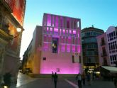 El Da Internacional de la Niña tiñe de rosa la fachada del Ayuntamiento en la Plaza Belluga