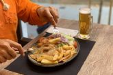 Diversos platos de comida tpica espanola en los restaurantes Taberna La Espanola