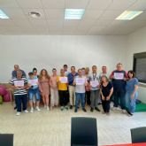 Entrega de diplomas del Programa de Formacin en Corresponsabilidad y Cuidados para Hombres en el centro de INTEDIS