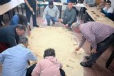 Las personas con discapacidad de Cartagena aprenden sobre arqueología en un taller adaptado