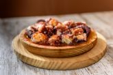 Pulpo a la gallega y pimientos de padrn: las recetas espanolas ms pedidas a domicilio en Murcia