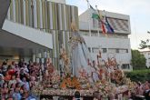 Procesiones letfica . Sevilla . El Carmen de San Leandro se cita con su barrio sevillano de las Huerta en una tarde de fervor popular