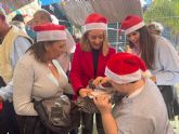 Pap Noel reparte regalos entre ms de un centenar de usuarios y profesionales del Centro para personas con discapacidad de Canteras